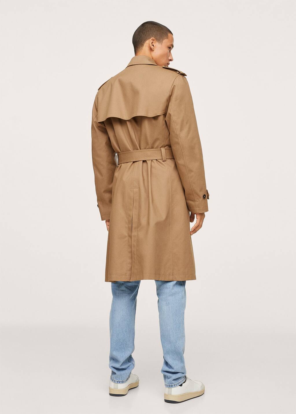 Mango Belt cotton-blend trench. a man wearing a tan trench coat and jeans. 