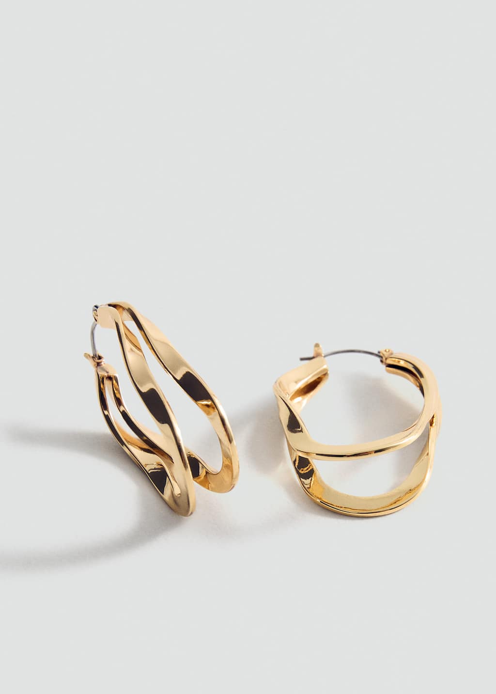 Mango Twisted Hoop Earrings Gold In Gold