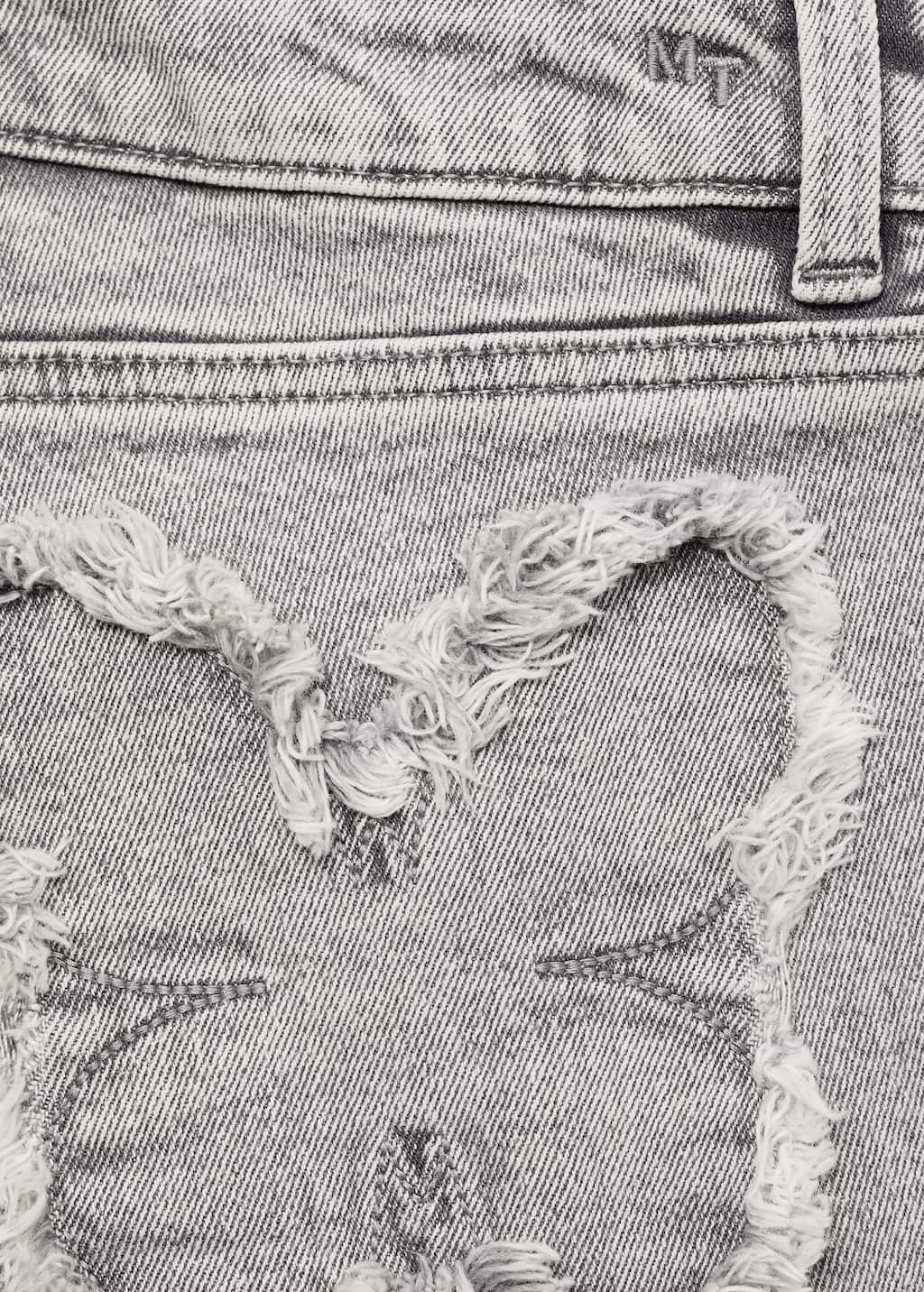 Straight jeans with embroidered butterflies
