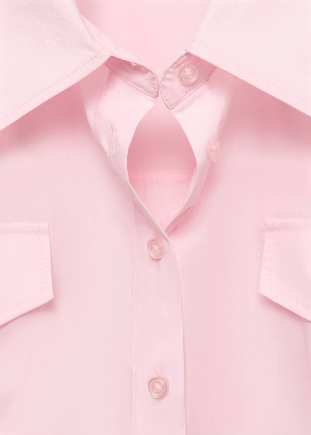 Shirt with pleats and pockets
