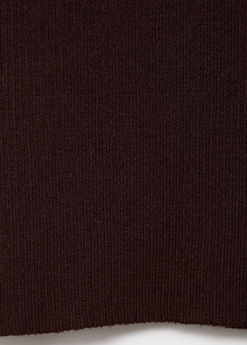 Knitted vest with slits