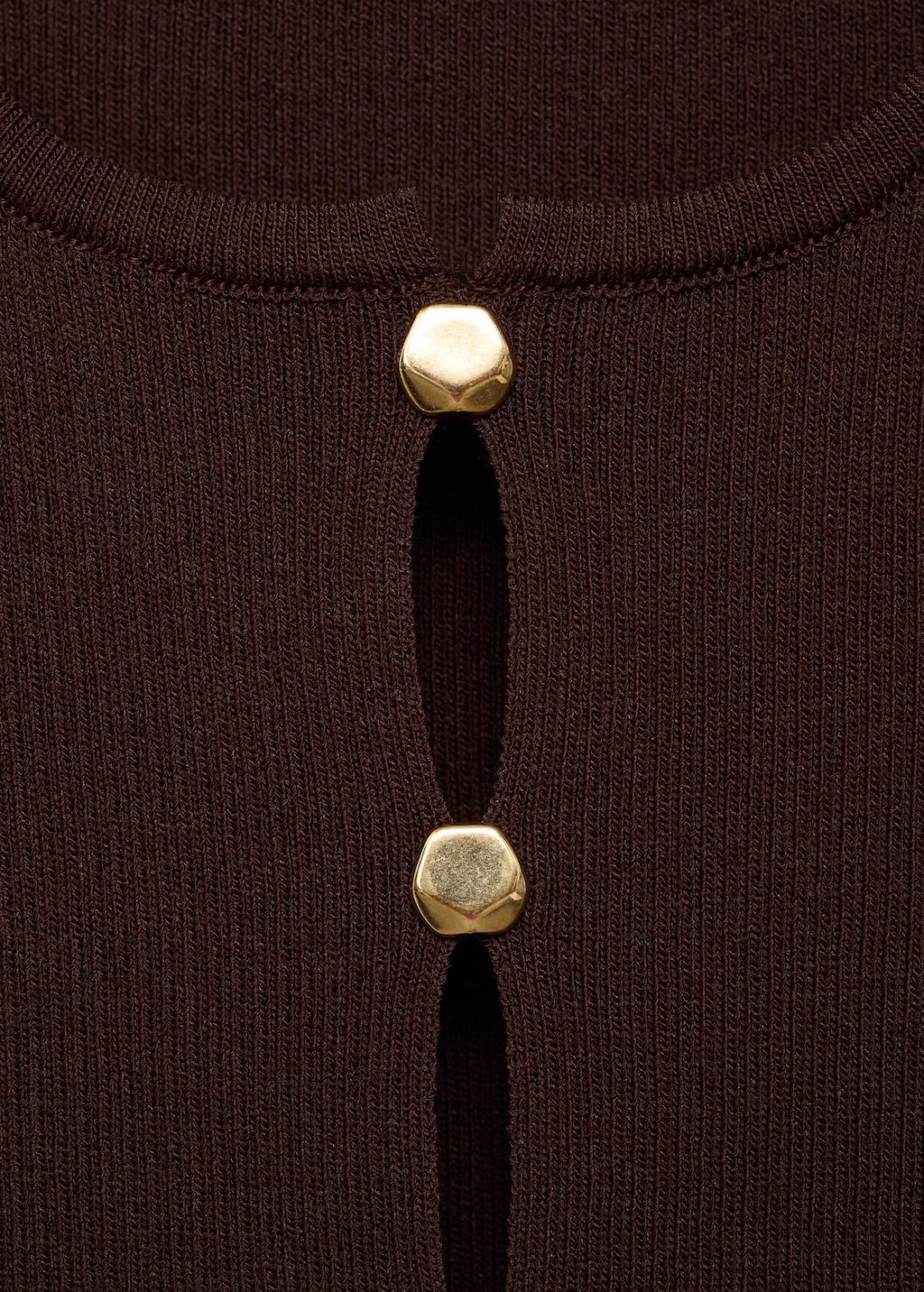 Knitted vest with slits