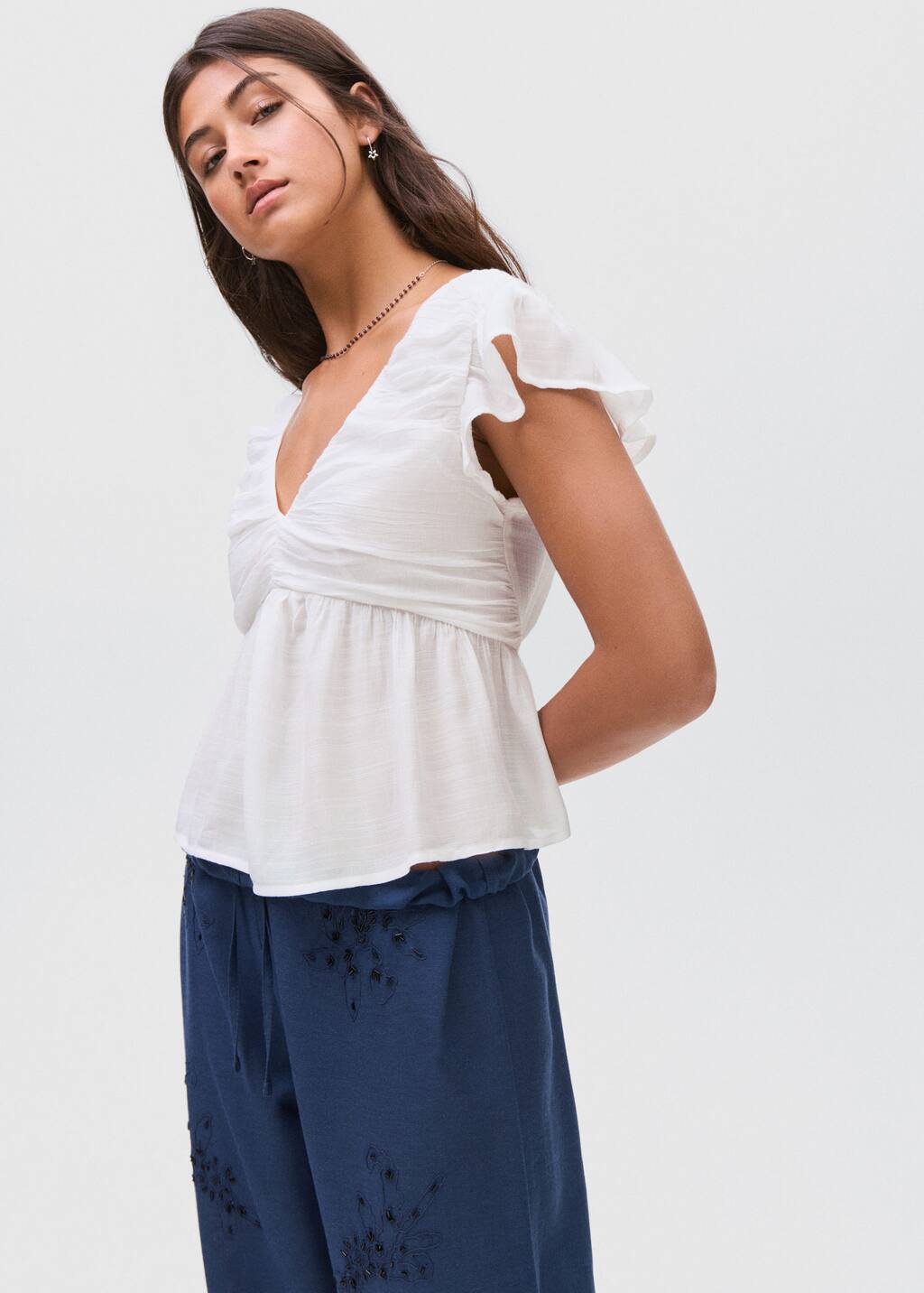 Ruffled shirred blouse