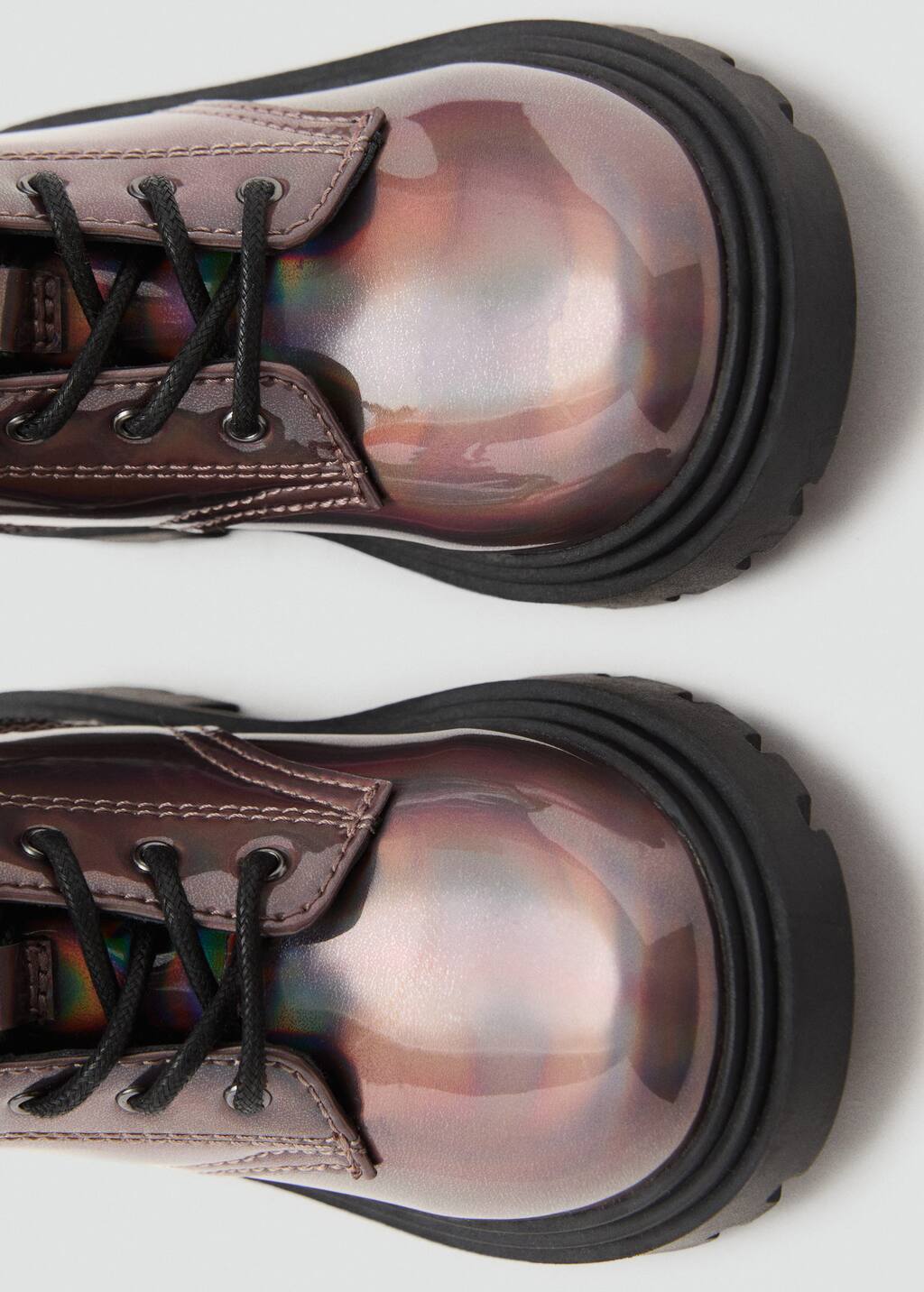 Zipped metallic boots
