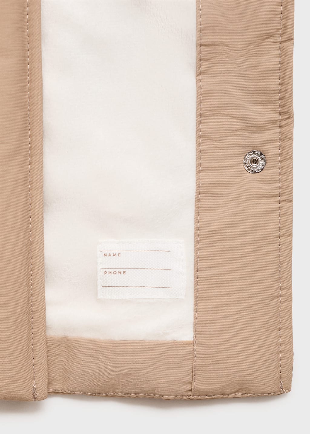 Trench coat with fur lining