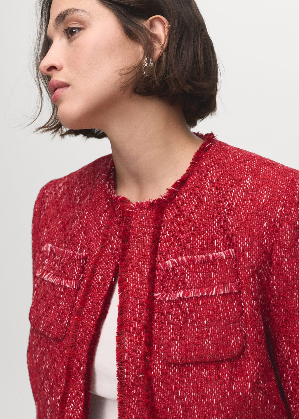 Tweed jacket with frayed ends