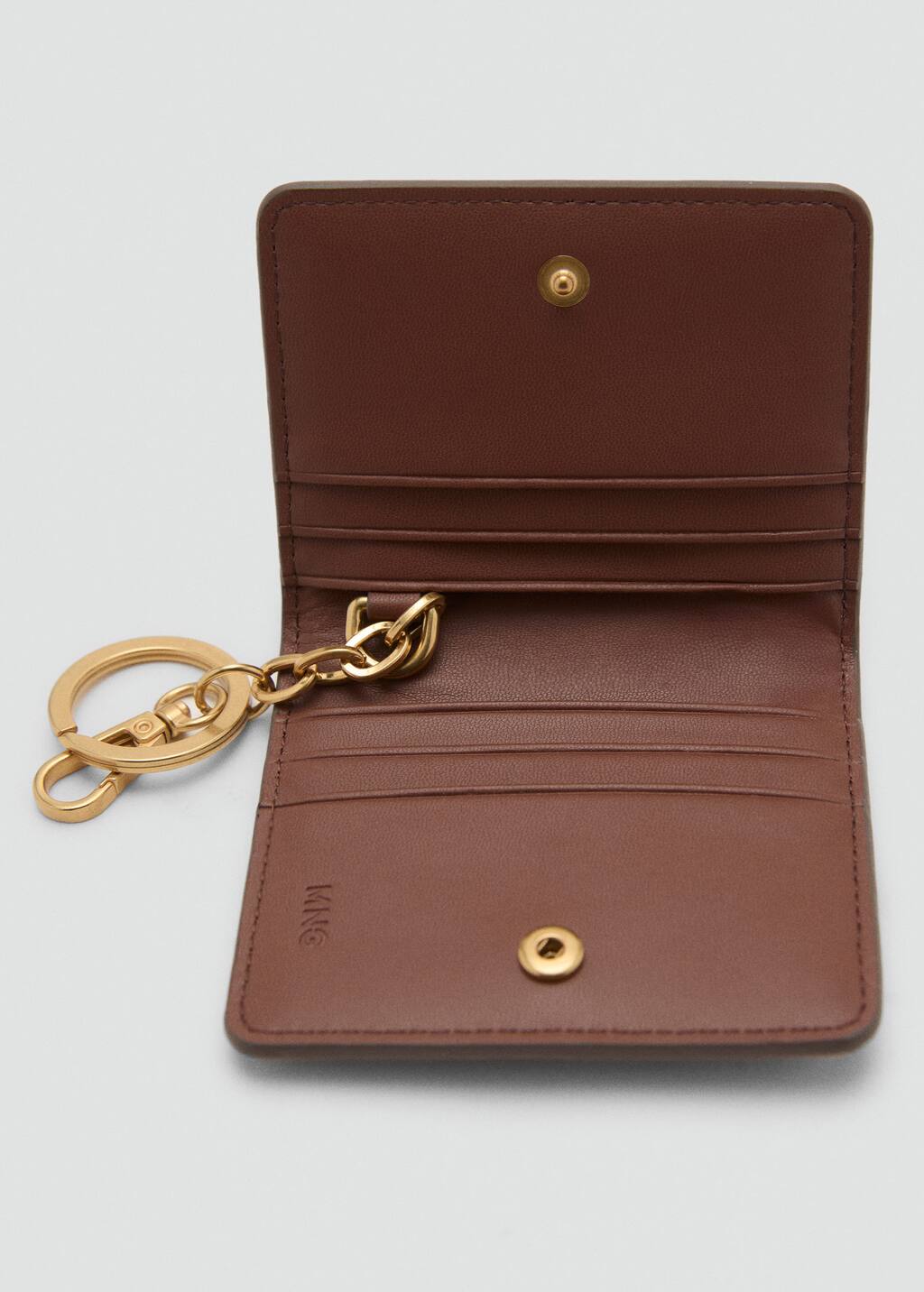 Studded wallet with keychain detail