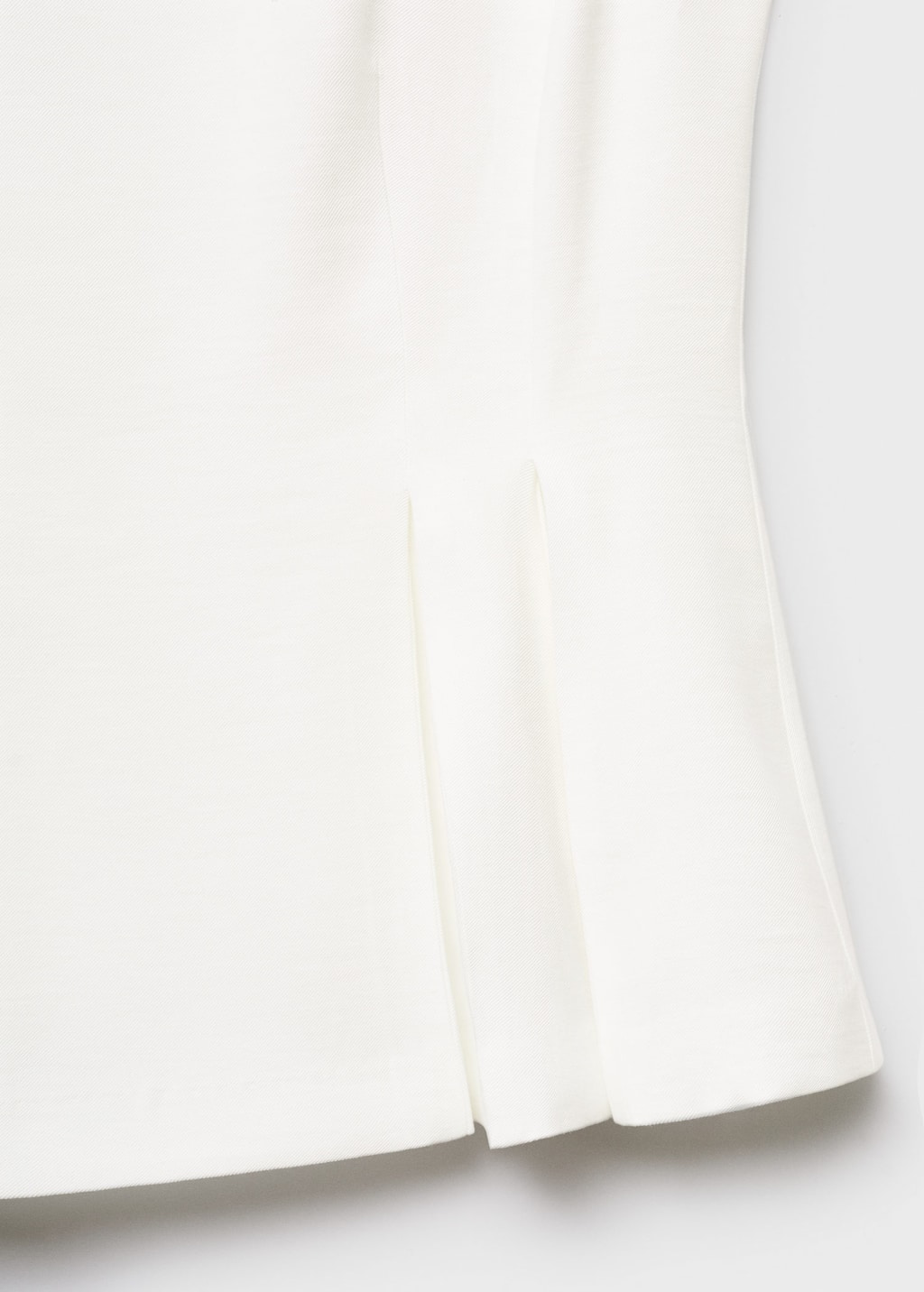 Peplum top with pleat detail