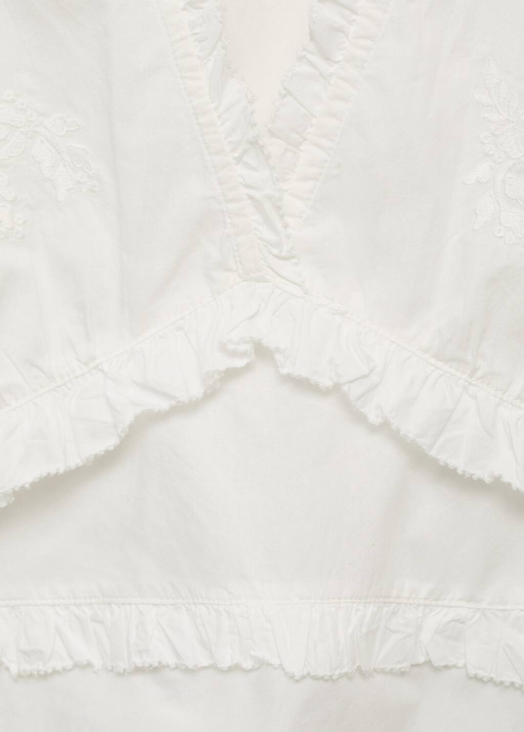 Ruffled embroidered blouse
