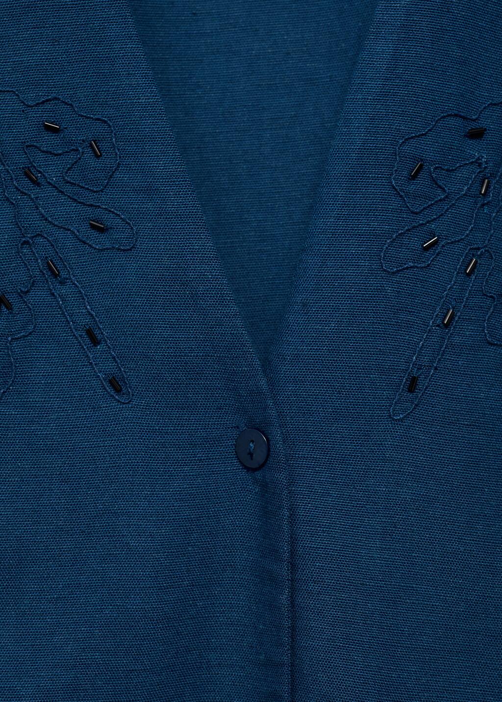 Embroidered linen vest