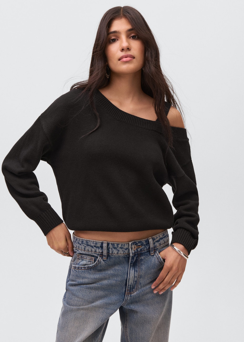 Knitted sweater with cut-out