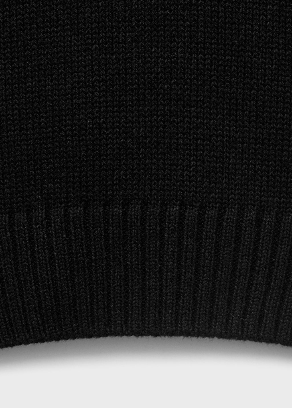 Knitted sweater with cut-out