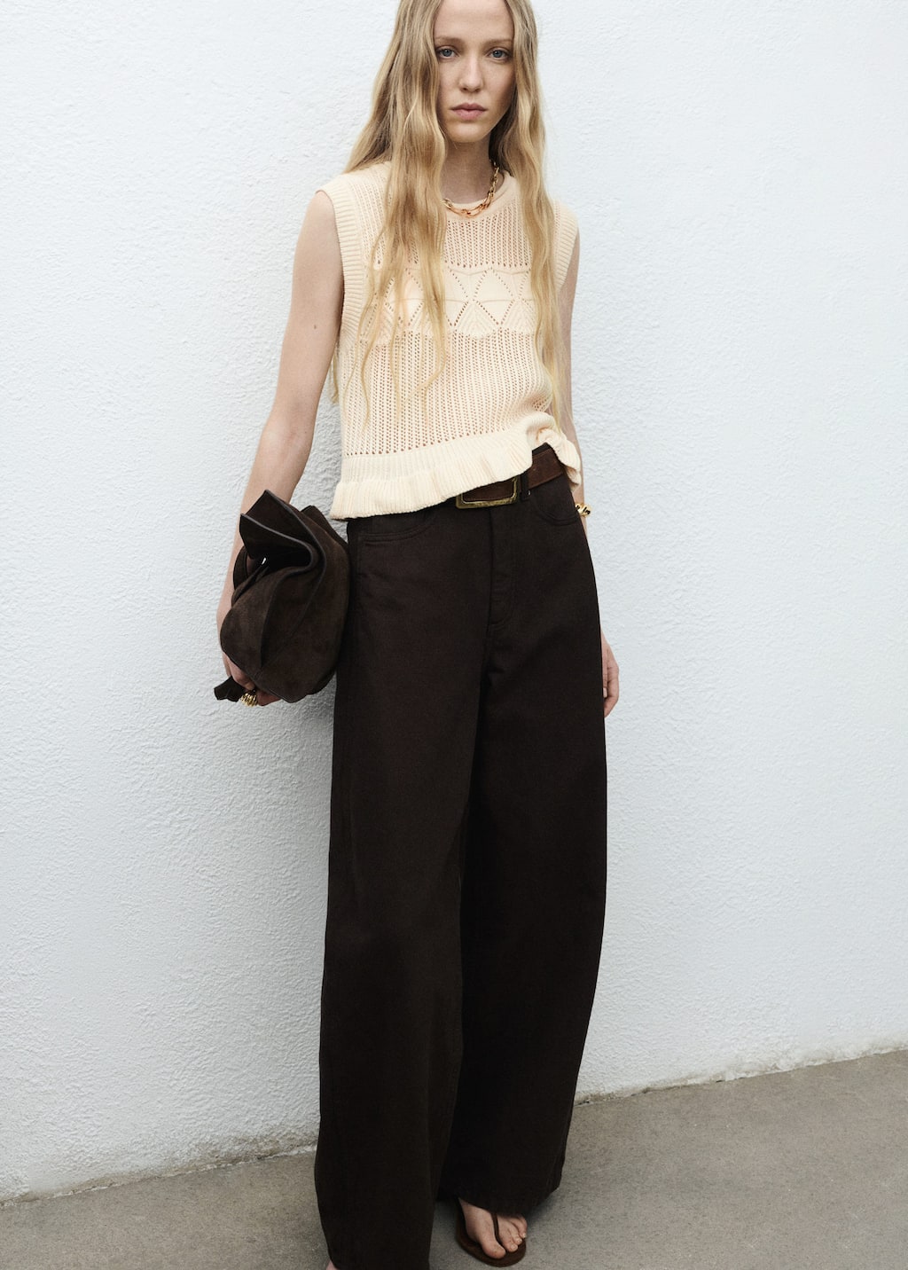 Openwork knit vest with ruffle