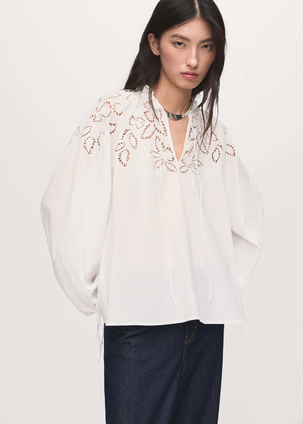Embroidered blouse with bows