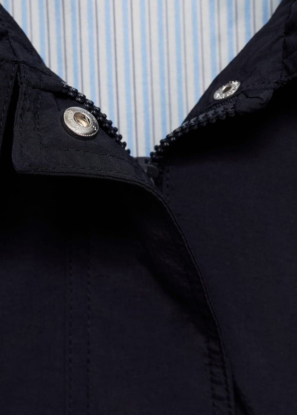 Trench coat with button detail