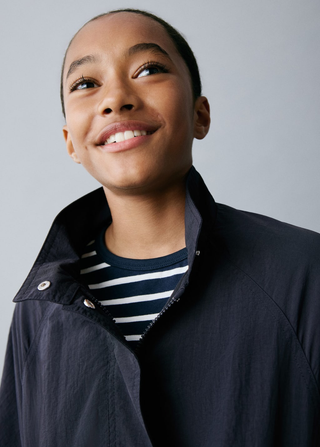 Trench coat with button detail