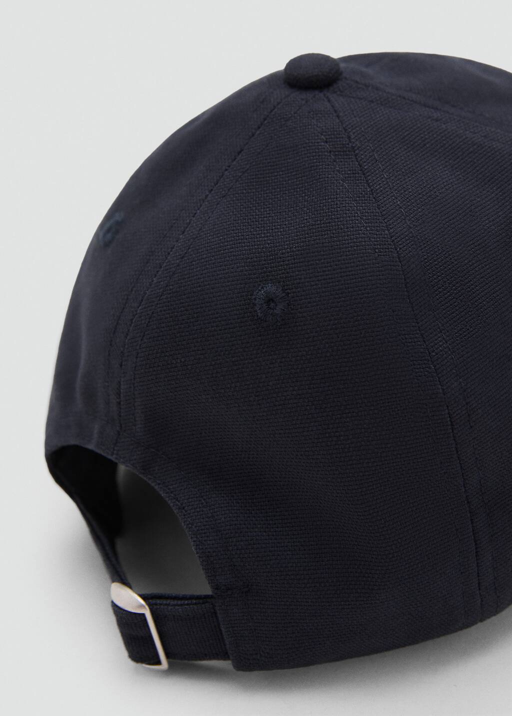 Cap with embroidered letter