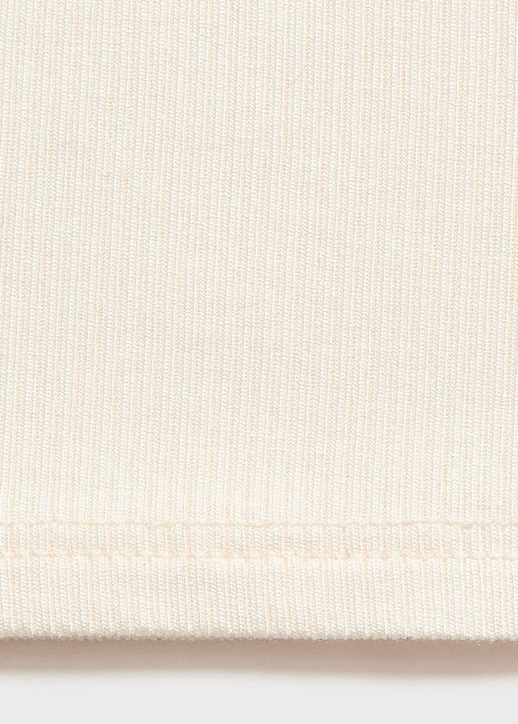 Top with perforated neckline