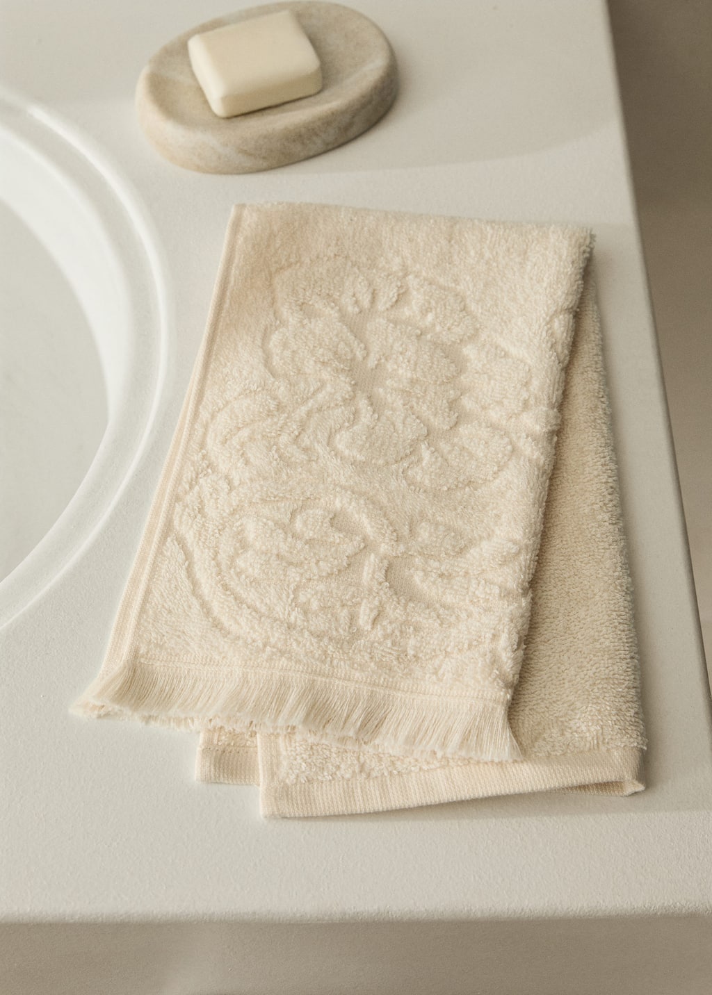Hand towel with floral trim
