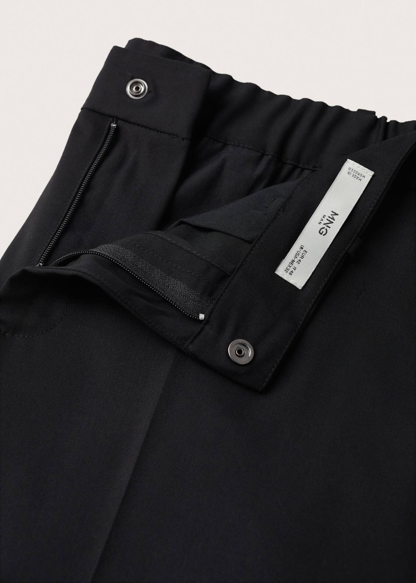 Viscoseblend slim fit trousers Man MANGO OUTLET United Kingdom