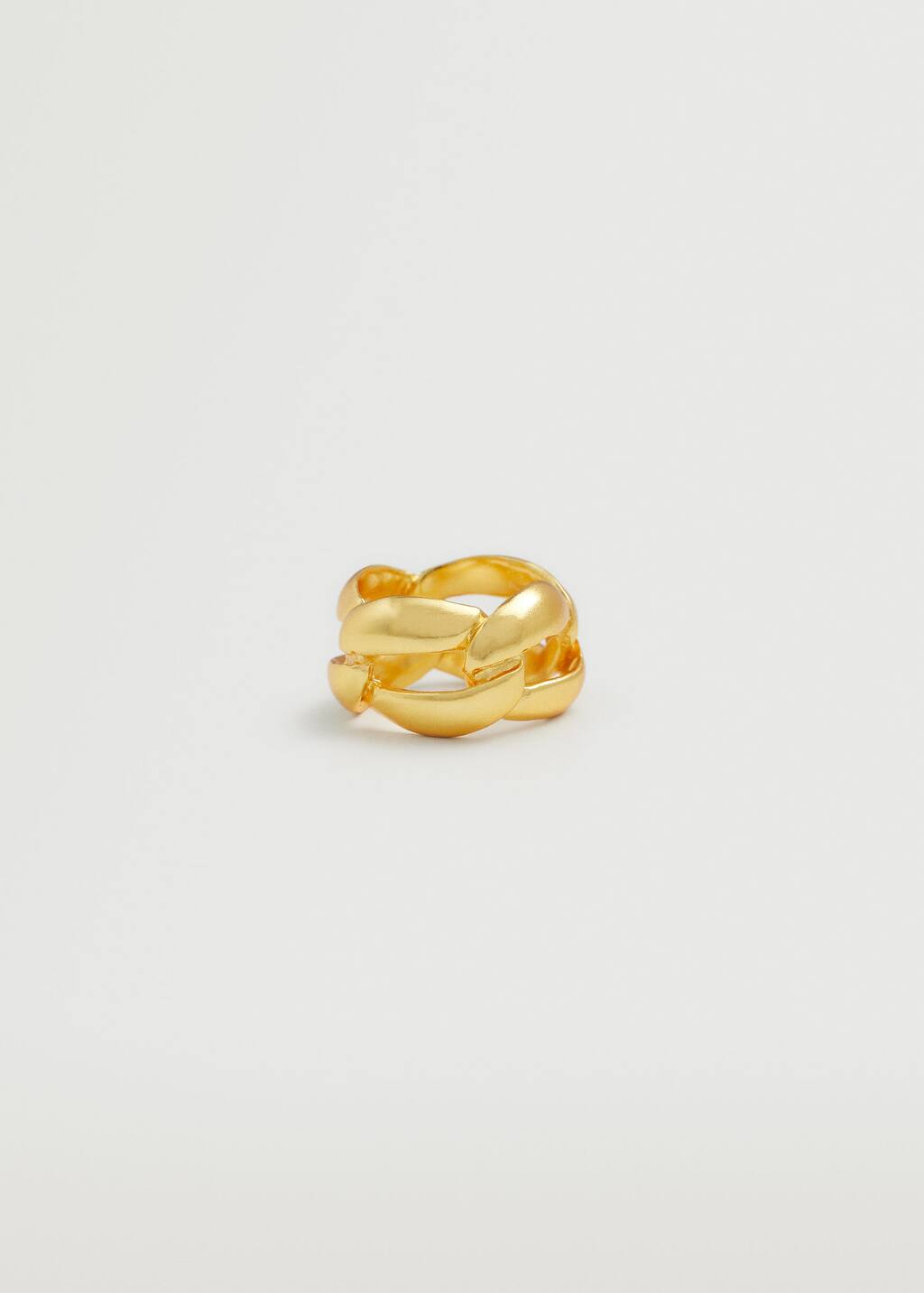 Mango Chain ring. a gold ring that is on top of a table. 