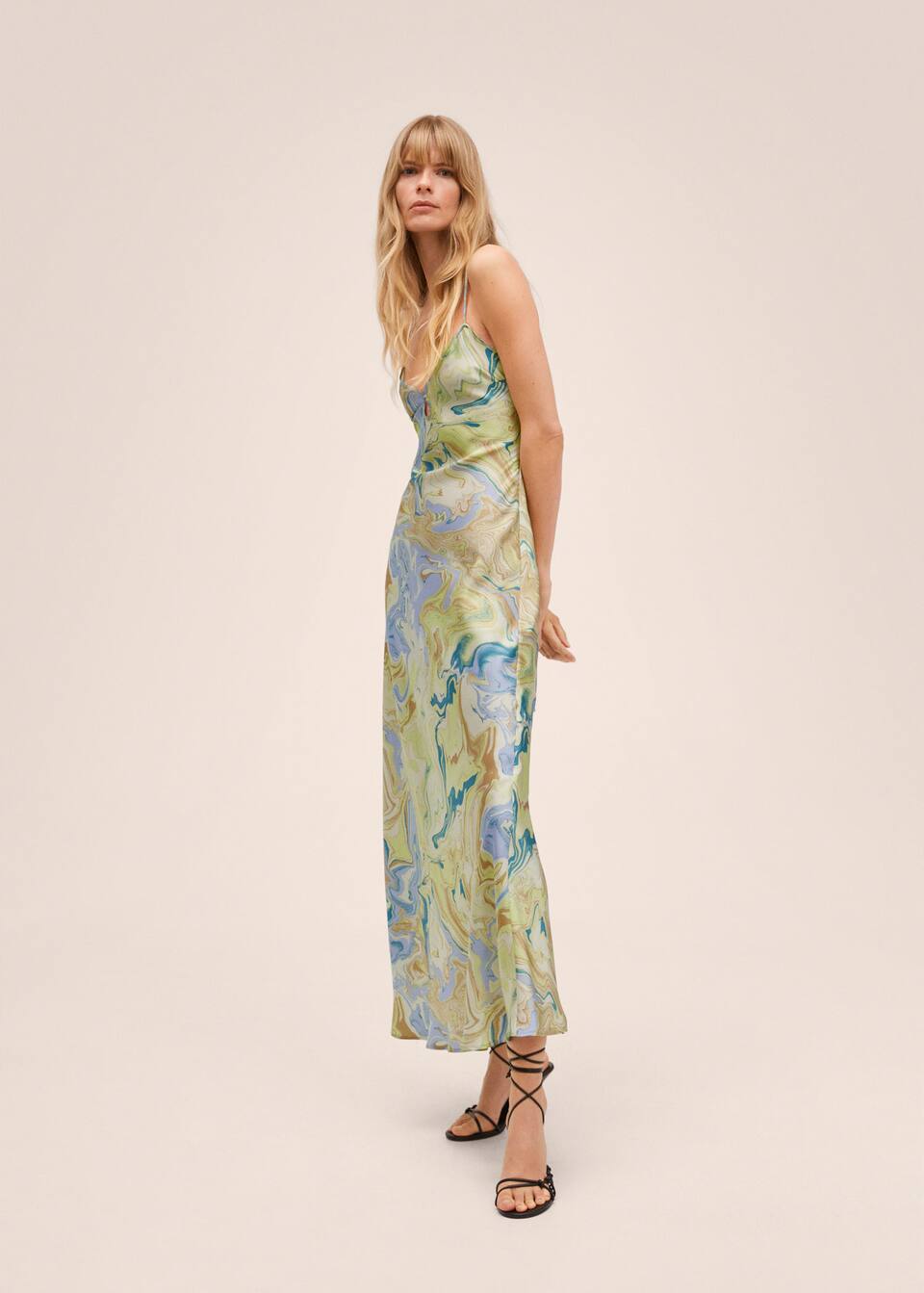 Marble print, maxi length slip dress with Slit detail in pastel tones. Thin straps crossover at the back. Side zip fastening.