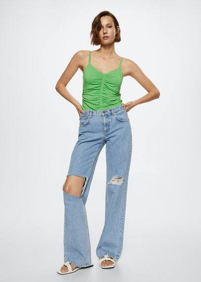 Top dettaglio increspato