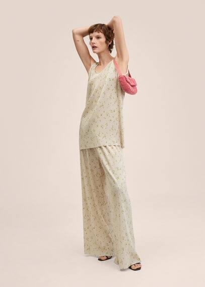 Top plissettato floreale