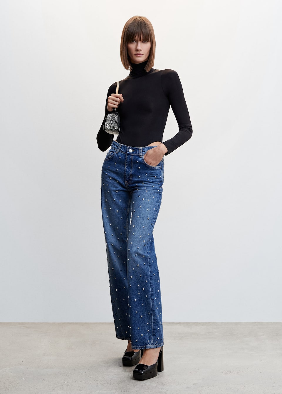 Mango blue denim rhinestone embellished jeans. These wide leg jeans have rhinestone embellished details all over and are ready to party. They have a wide leg and zip and button fly with 5 pockets and belt loops.