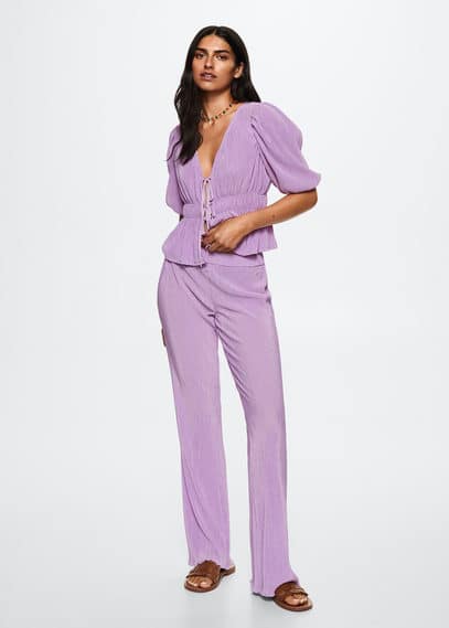 Blusa plissettata volant