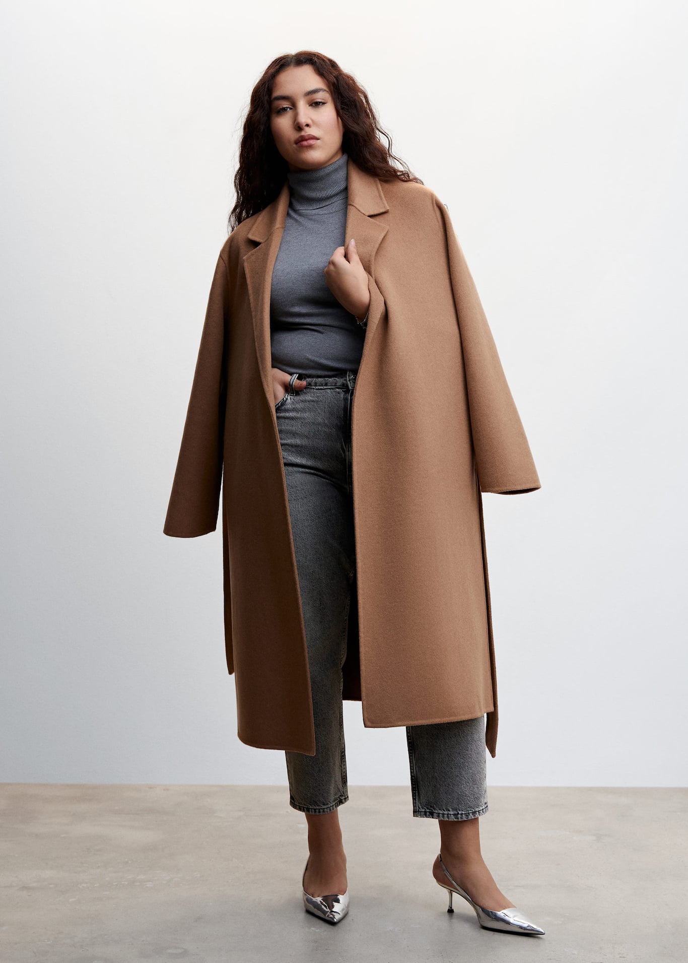 Mango Mom High Waist Jeans in grey. Made with 100% Recycled cotton-blend fabric. Mom-fit with High waist. Five pockets. Loops. Zip and one button fastening. Inseam 70 cm. Plus Size Available. Fits small to size.