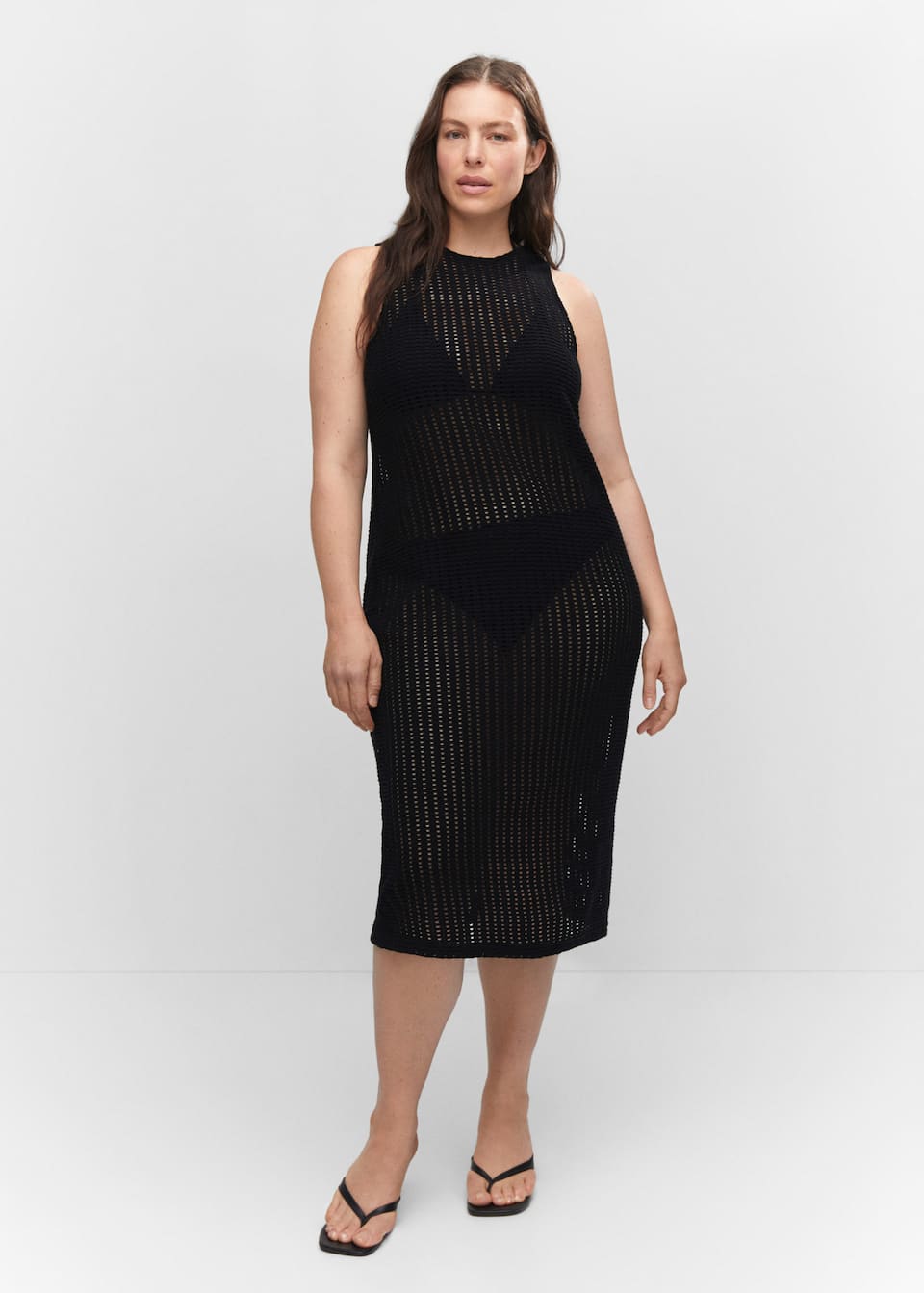 Black summer dresses are the versatile and easy way to get dressed on hot summer days! Cotton fabric. Openwork knit fabric. Straight design. Midi design. Rounded neck. Wide straps. Unclosed. Side slit.