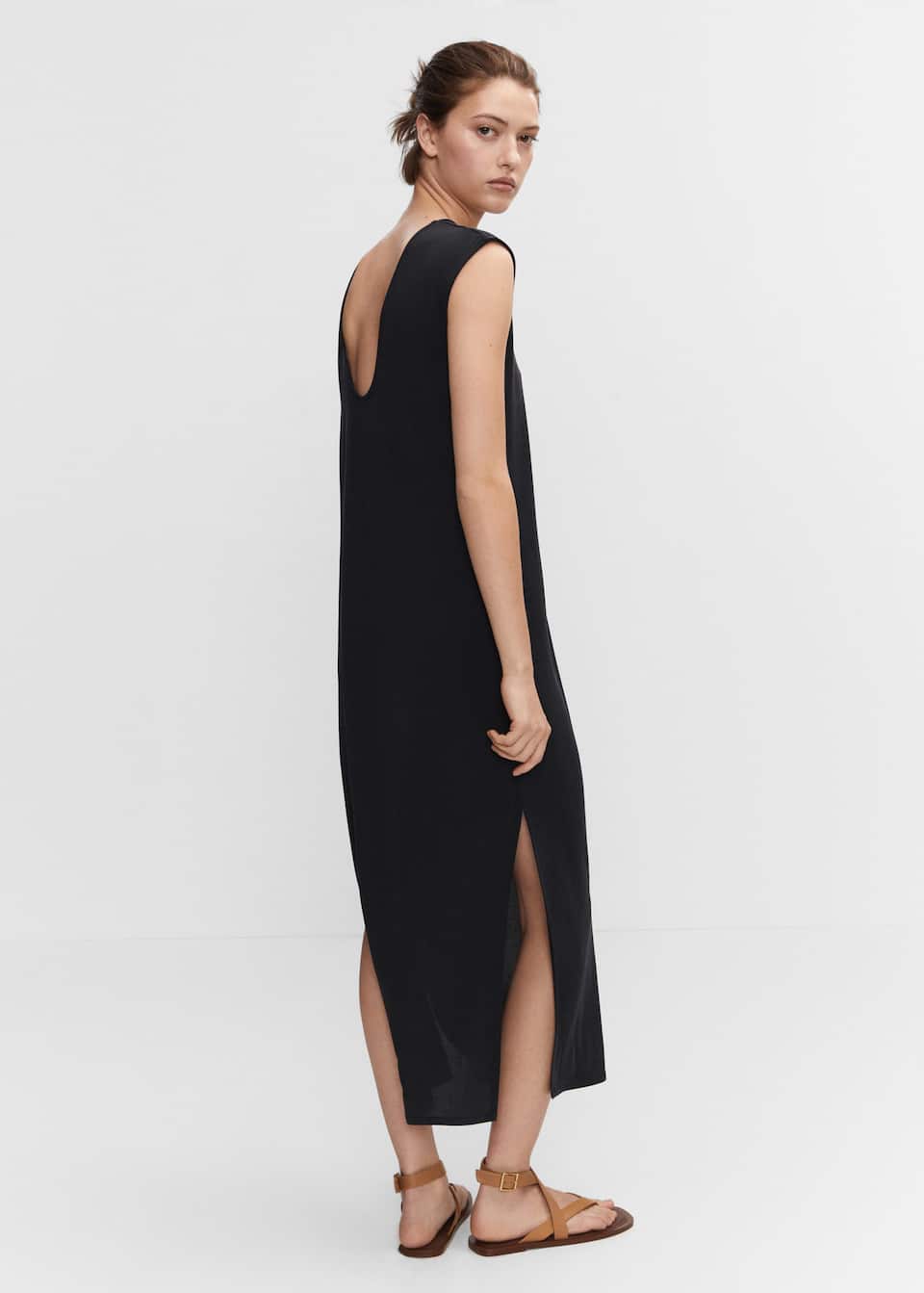 Black summer dresses are the versatile and easy way to get dressed on hot summer days! Mango Modal-blend slit maxi dress with thick straps, round neck and lightly scooped back is such an easy thrown black summer dress.