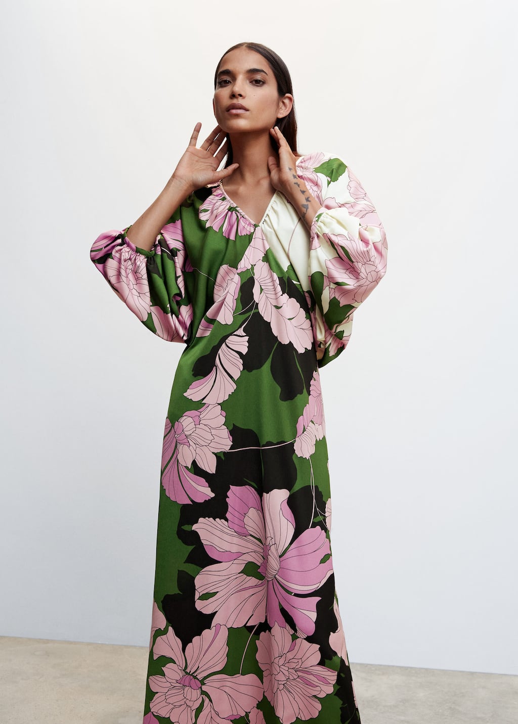 Mango Floral print dress. a woman in a long floral dress posing for a picture. 