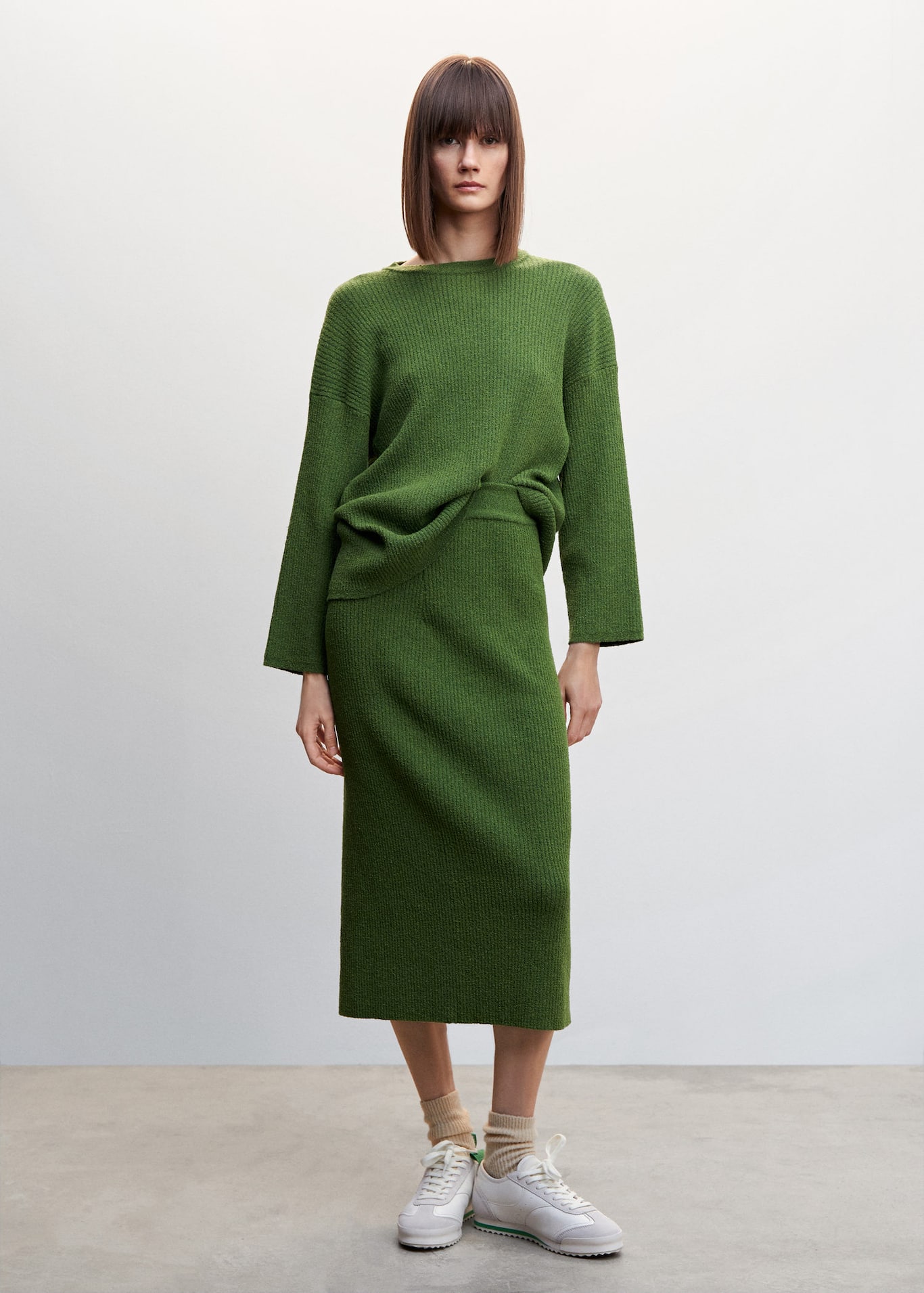 Mango spring green Fine knit oversize sweater with Three quarter sleeve and Rounded neck. Matching knit midi skirt available.