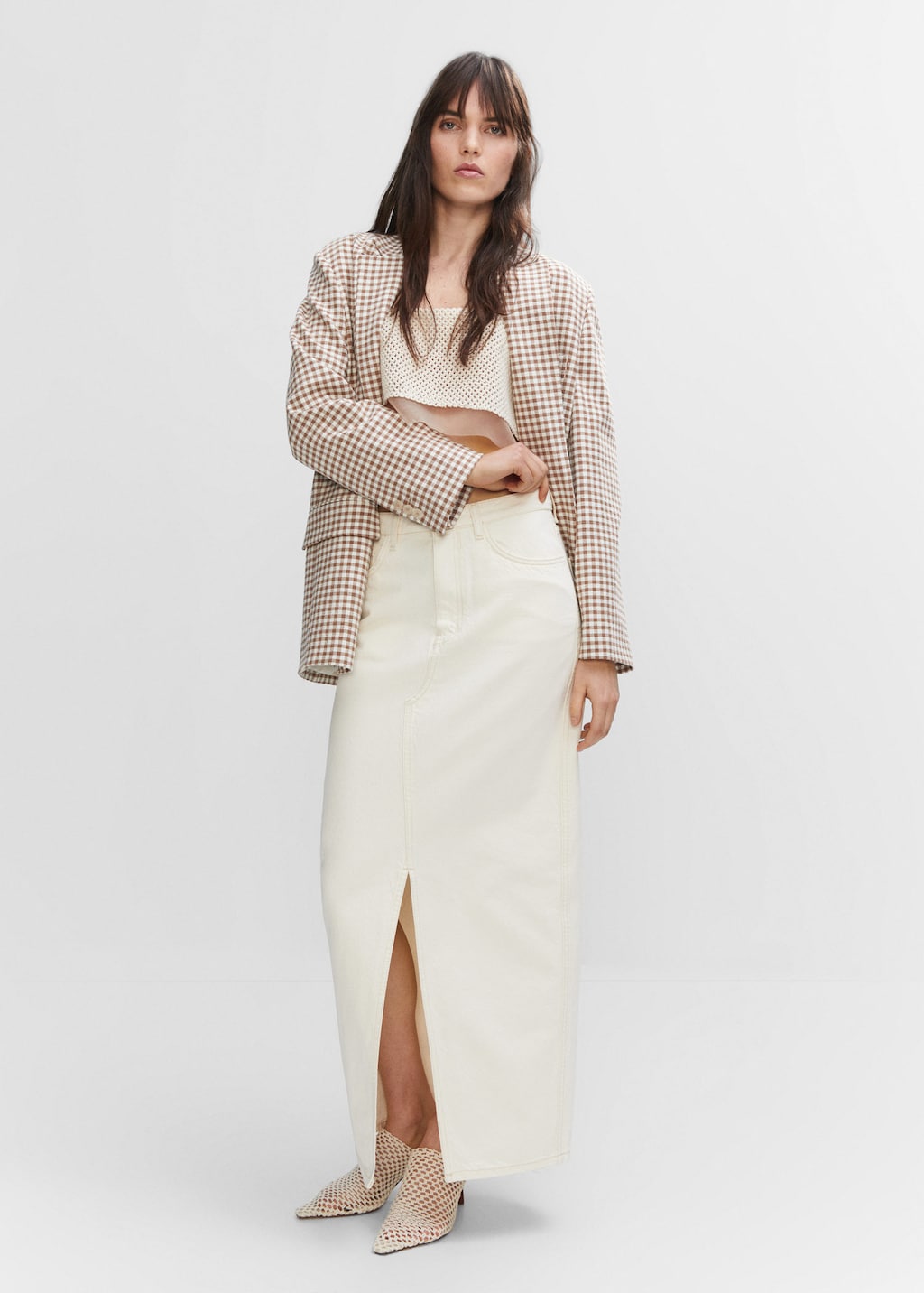 This ecru Slit denim skirt is a perfect spring-friendly jeans alternative.