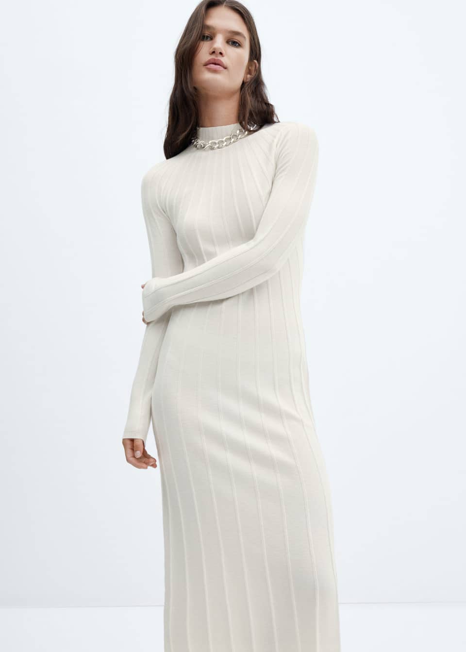 Mango cream knit midi dress with mock neck and long sleeves. It has a form fitting silhouette and a rib knit.