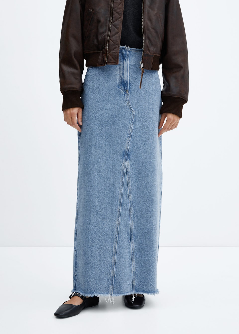 Best high street Maxi skirts. Mango denim maxi skirt from the Circular Design Collection, using Recycled cotton-blend fabric. This Long denim skirt has a Concealed zip fastening, Two side pockets, Back slit, Frayed hem and Two patch pockets on the back.