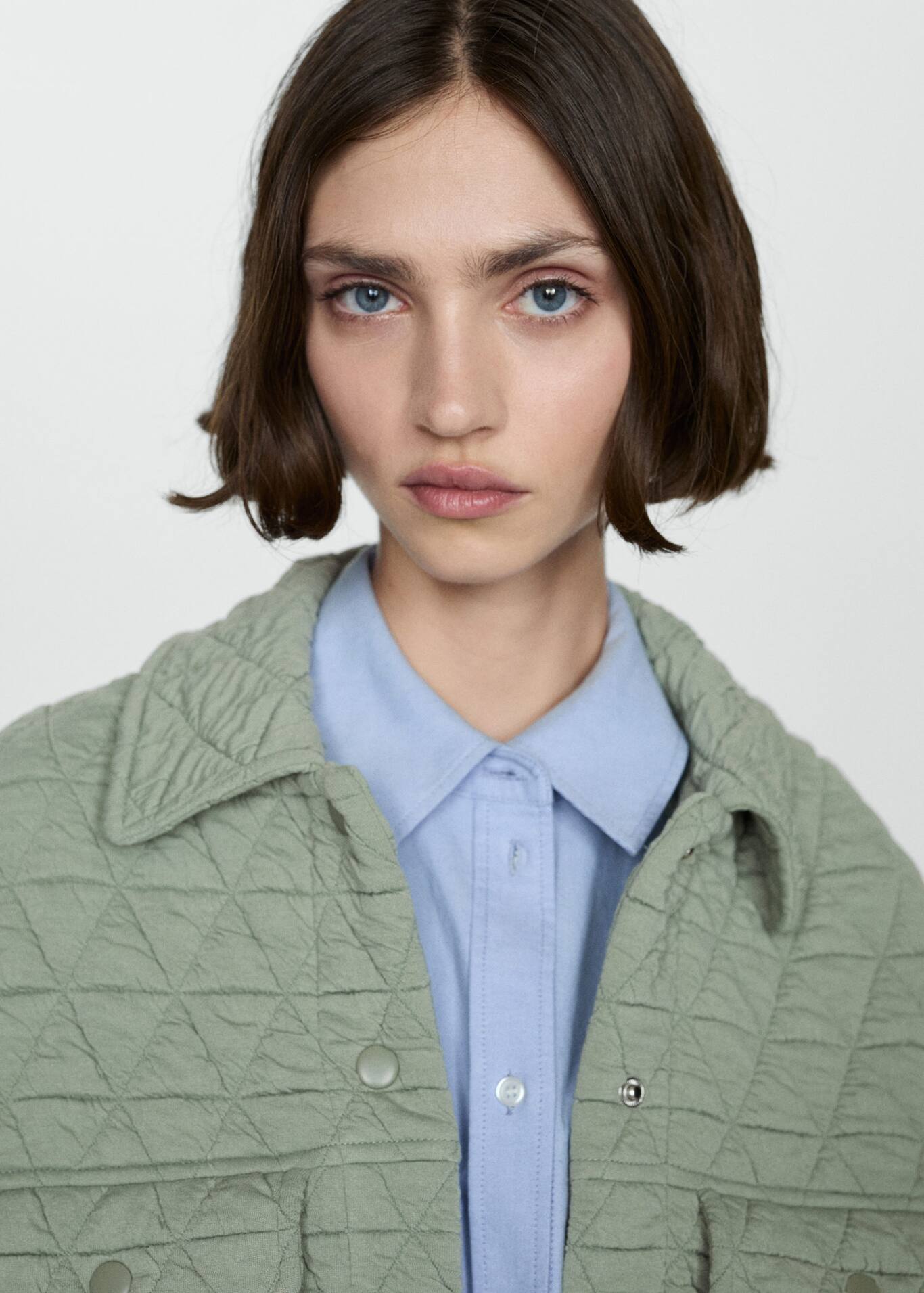 Quilted vest with buttons Women Mango USA