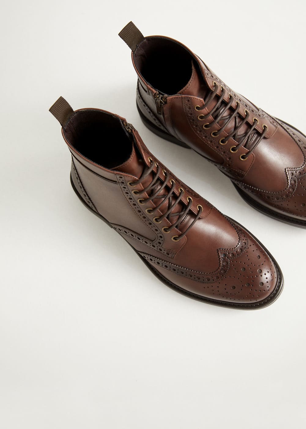 stitching suede boots