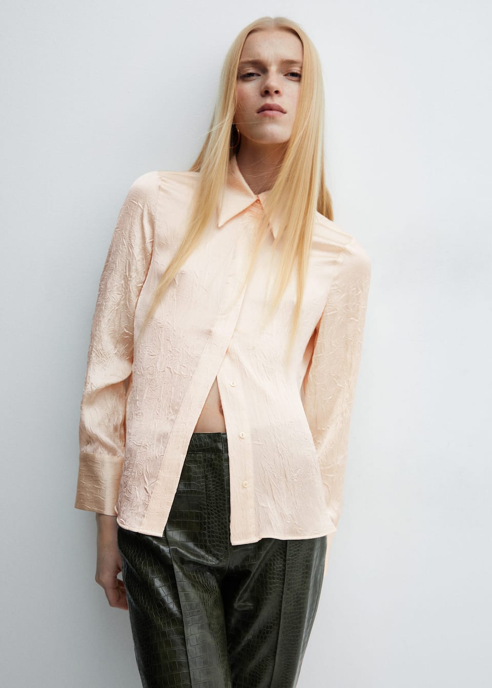 Tap into the fashion colour trends 2024 with this peach Mango crushed satin shirt.