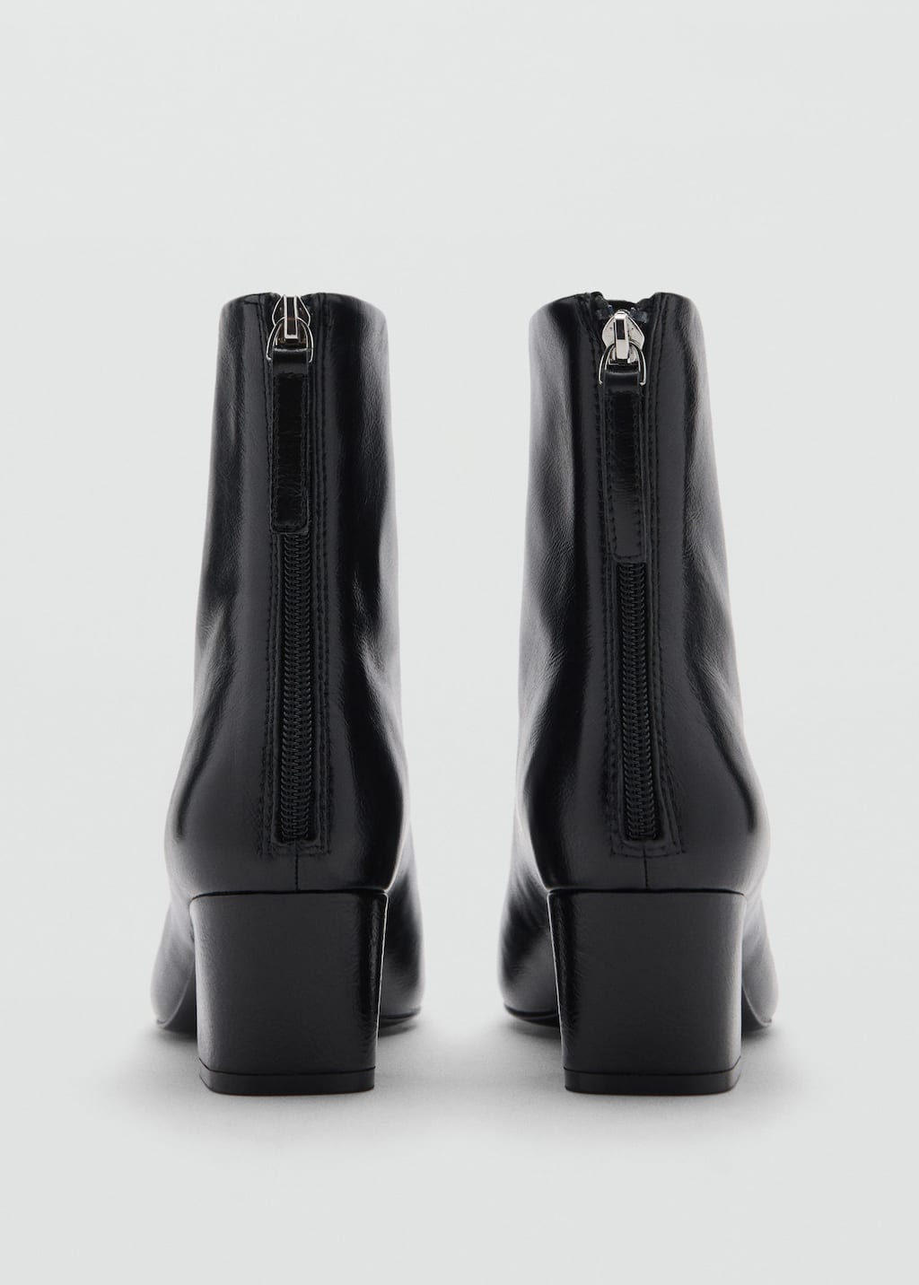 Zipped leather ankle boots