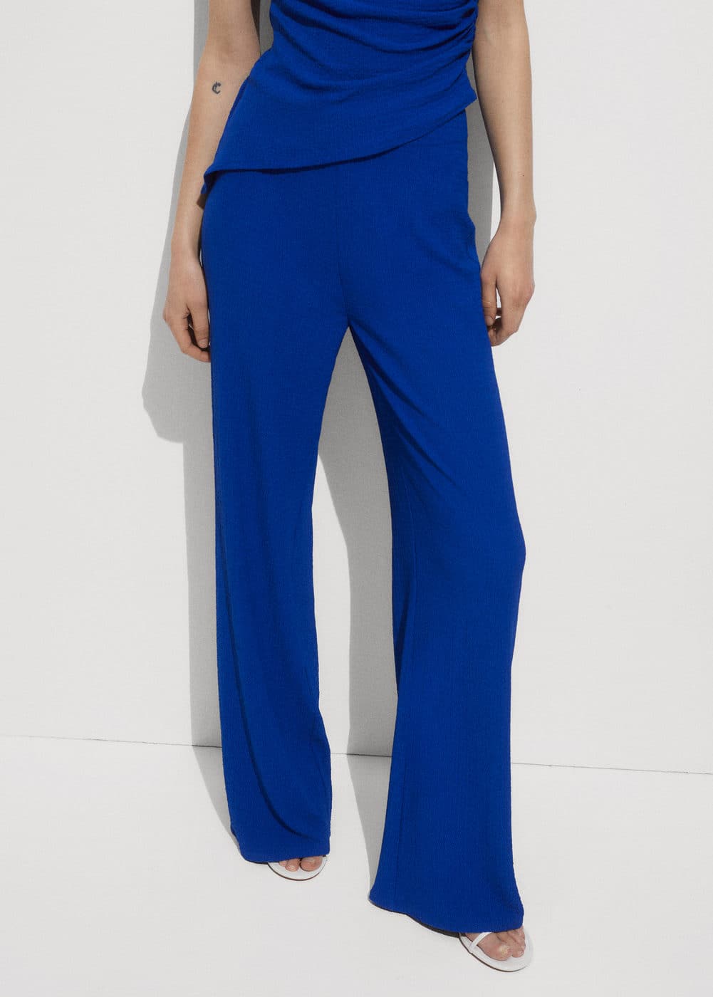 Flowy straightfit trousers Woman Mango Bahrain