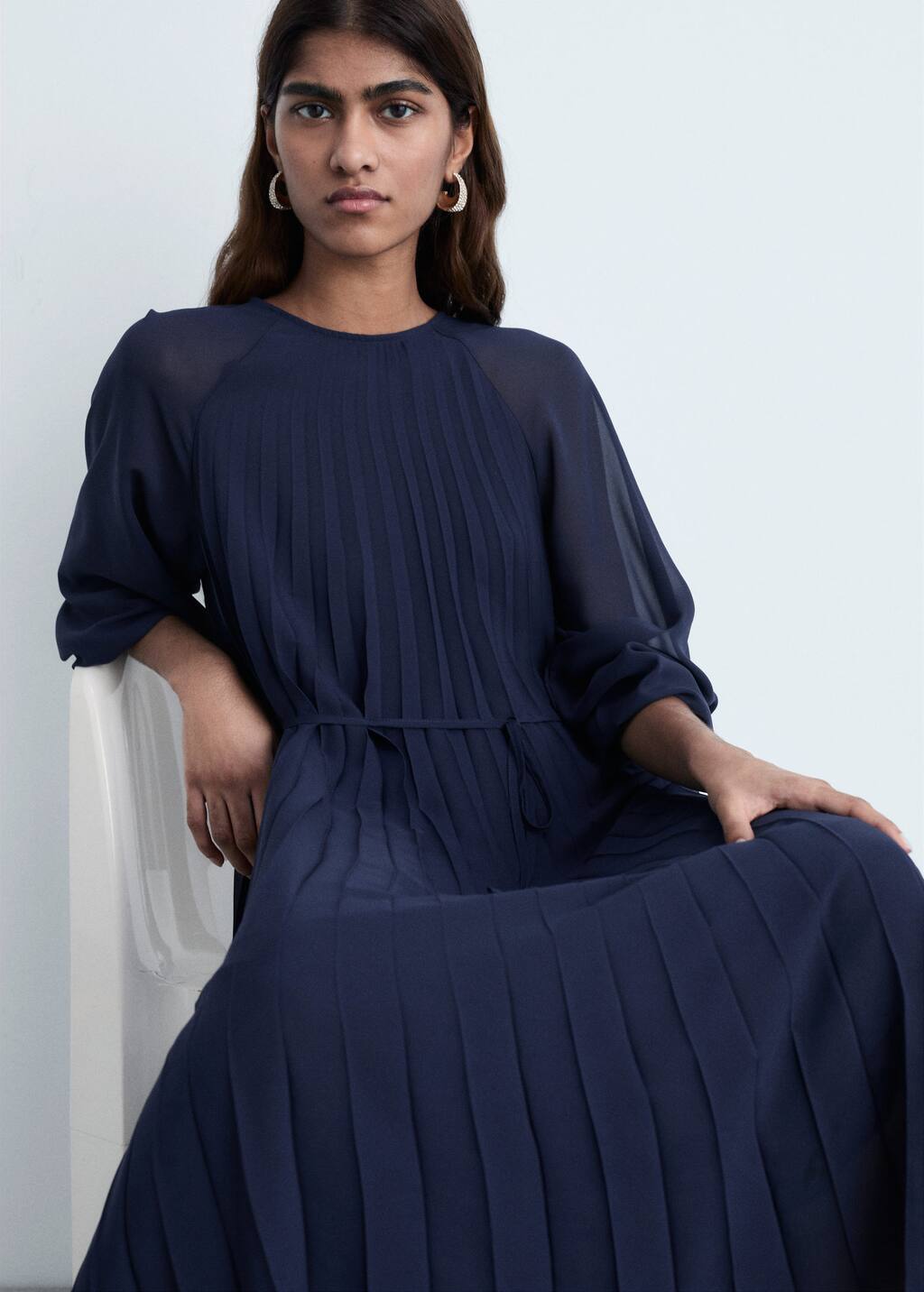Pleated dress with bow belt