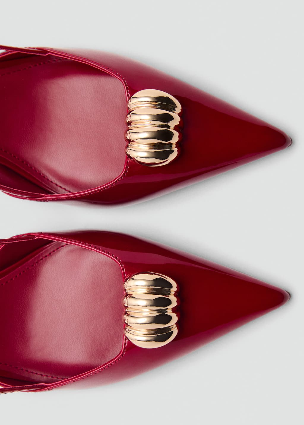 High-heeled shoes with metallic detail