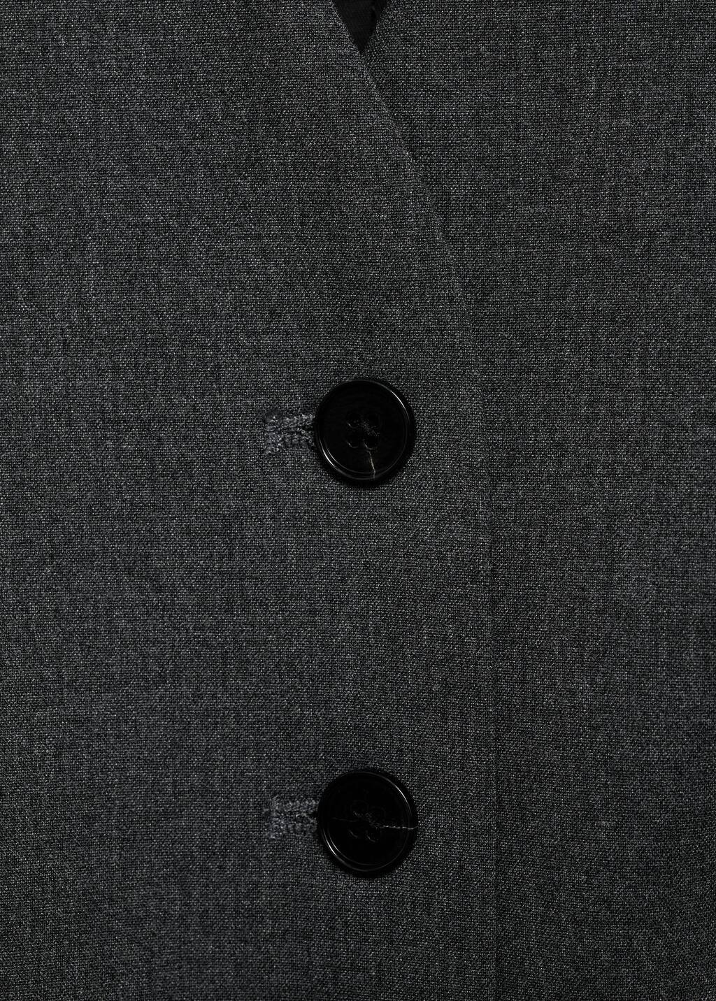 Vest with adjustable belt